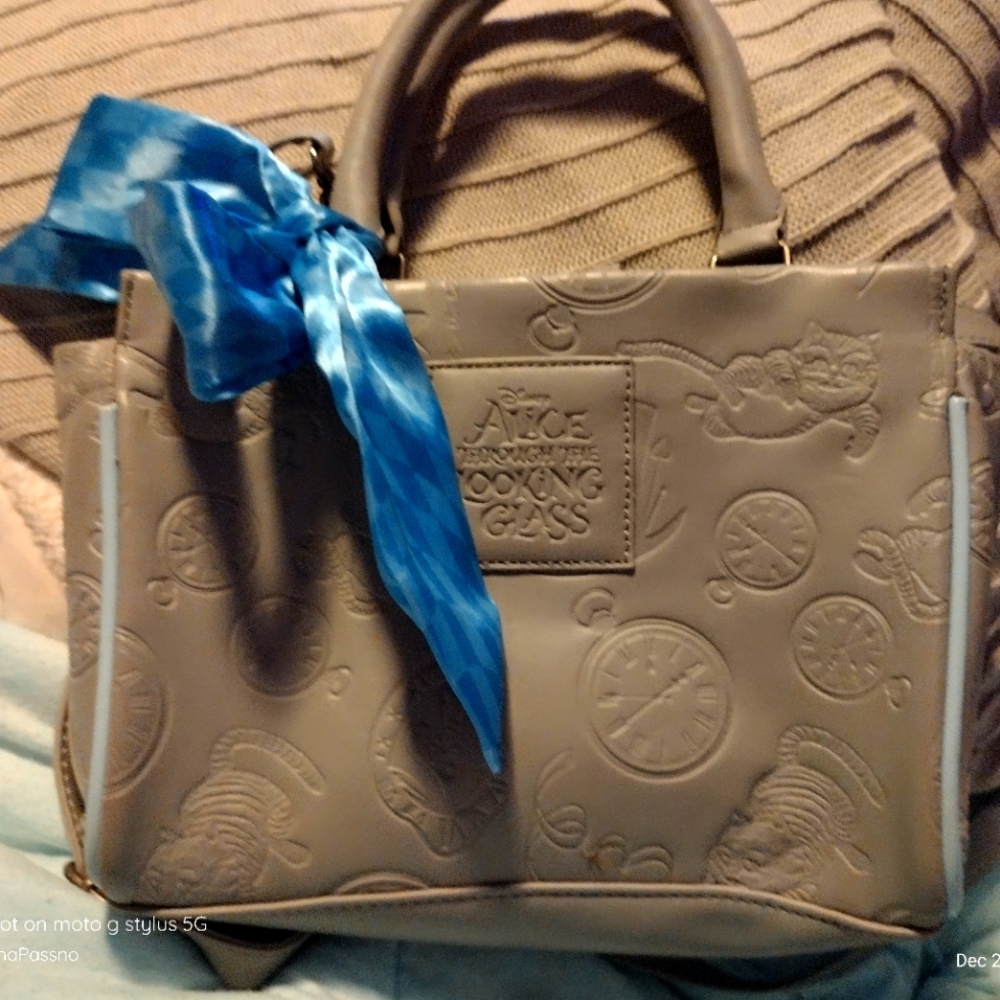 RARE lounge fly alice through the looking glass purse